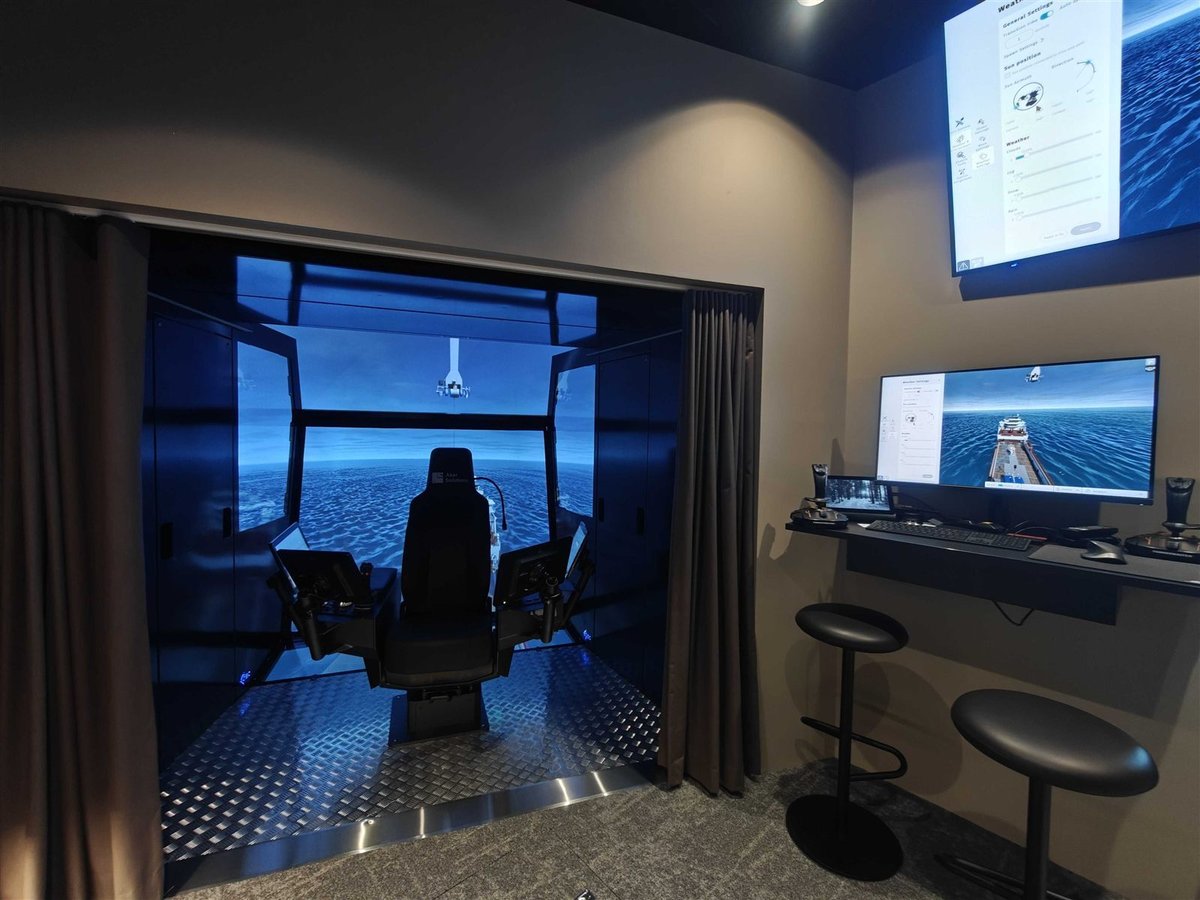 Crane cabin simulator with a chair and joysticks Crane cabin simulator with a chair and joysticks