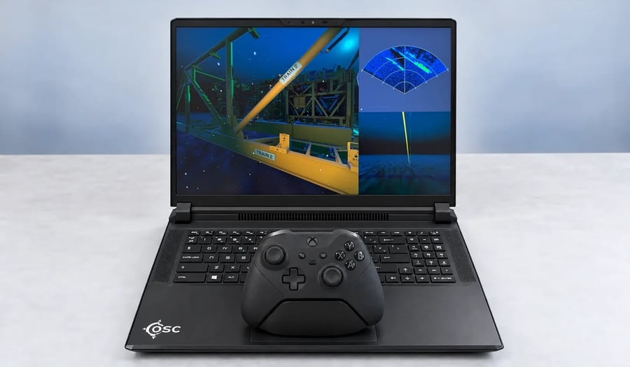 A laptop running an ROV simulation, with a game controller on the keyboard A laptop running an ROV simulation, with a game controller on the keyboard