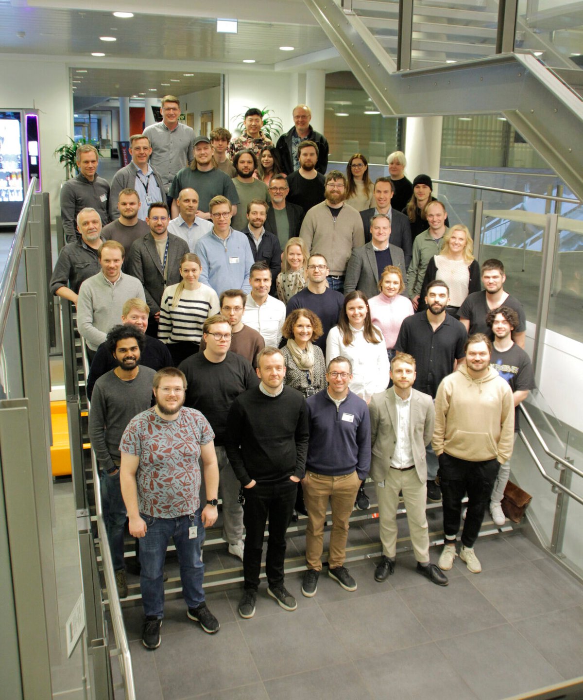 The OSC team gathered on a staircase The OSC team gathered on a staircase